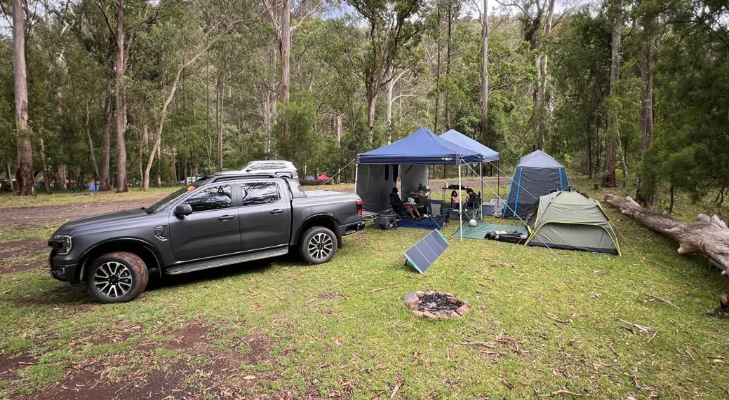 The Ranger at a woodland campsite